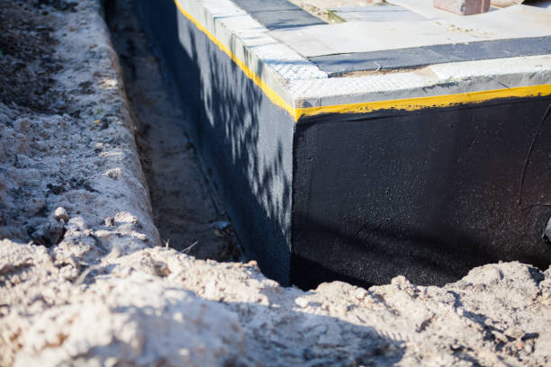 Professional Waterproofing technician working in Nesconset, NY